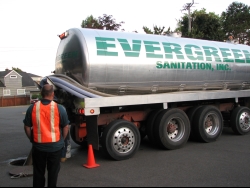 Evergreen Sanitation truck and worker